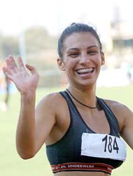 Named World's Hottest Track and Field Star, Gretta Taslakian's Favorite  Rival Wins Hearts With a Big Win - EssentiallySports